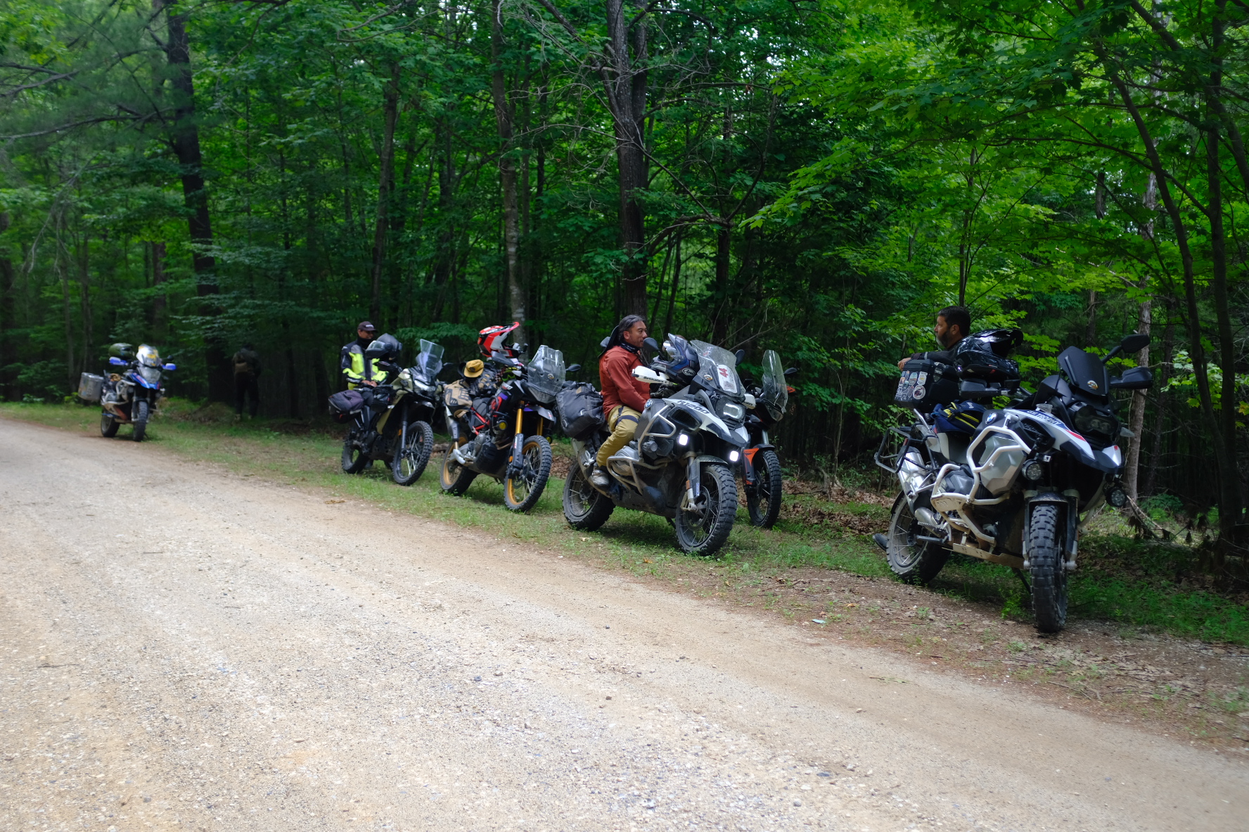 Adventure bikes lined up on a gravel road during the Penmerryl Farm weekend